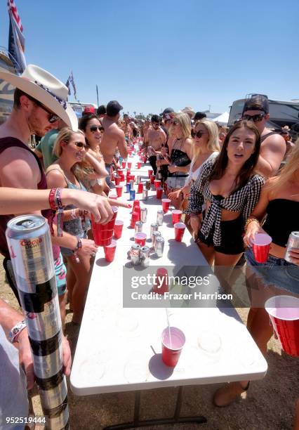 Festivalgoers play beer pong during day 2 of 2018 Stagecoach California's Country Music Festival at the Empire Polo Field on April 28, 2018 in Indio,...