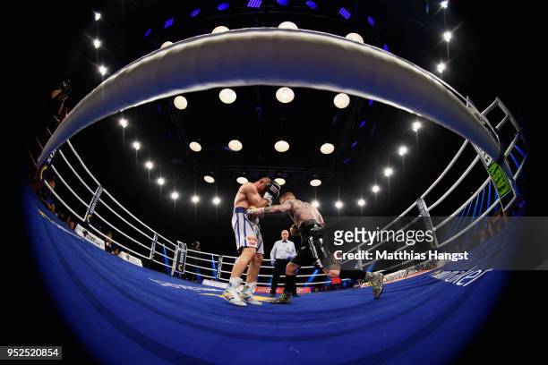 Arthur Abraham of Germany and Patrick Nielsen of Denmark exchange punches during their WBO international super middleweight title fight at...