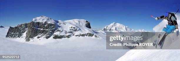 Ski in Tignes, on the back the mont Pourri and the Dome of Pramecou, Tarentaise, espace Killy, Savoy, France.