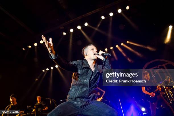 Singer The Dark Tenor performs live on stage with Unheilig during a concert at the Columbiahalle on April 28, 2018 in Berlin, Germany.