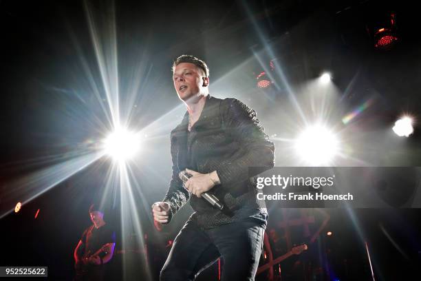 Singer The Dark Tenor performs live on stage with Unheilig during a concert at the Columbiahalle on April 28, 2018 in Berlin, Germany.