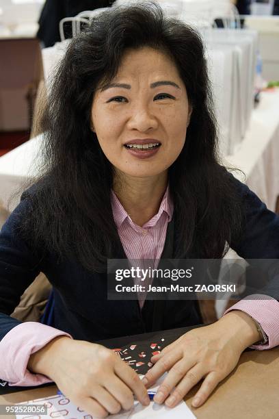 Eun Ja Kang femme de lettres francaise, lors de la 32eme foire du livre de Brive, a Brive la Gaillarde en France le 8 novembre 2013. Elle est le...