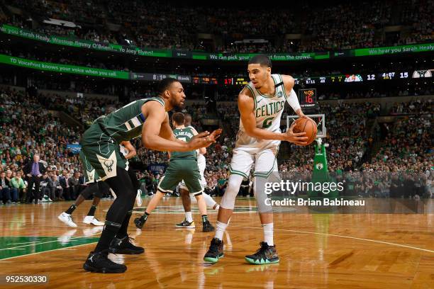 Jayson Tatum of the Boston Celtics handles the ball against the Milwaukee Bucks in Game Seven of Round One of the 2018 NBA. Playoffs on April 28,...