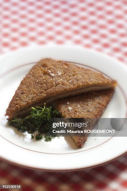 The so called Bouchons are the traditional lyonese bistros. Daniel & Denise. Tablier de Sapeur, a typical lyonese dish including tripe. On February...