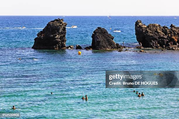 Holidaymakers on the beaches of Le Cap d'Agde on August 08, 2012 in Le Cap d'Agde, Herault, Languedoc-Roussillon, France.