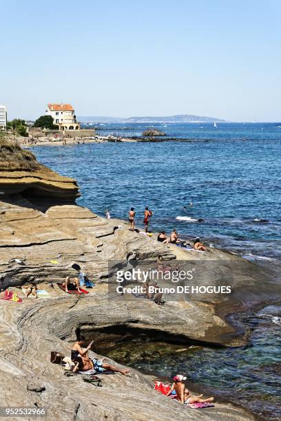 Holidaymakers on the beaches of Le Cap d'Agde on August 08, 2012 in Le Cap d'Agde, Herault, Languedoc-Roussillon, France.