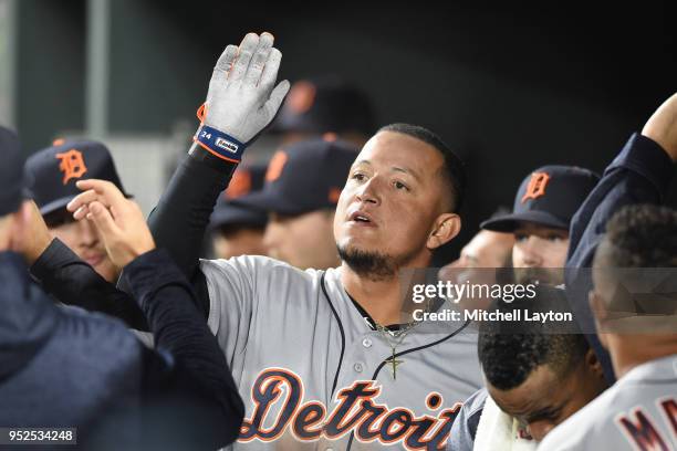 Miguel Cabrera of the Detroit Tigers celebrates hitting a three run home run in the second inning during a baseball game against the Baltimore...