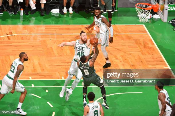 Aron Baynes of the Boston Celtics blocks Eric Bledsoe of the Milwaukee Bucks shot in Game Seven of the 2018 NBA Playoffs on April 28, 2018 at the TD...