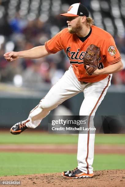 Andrew Cashner of the Baltimore Orioles pitches in the third inning during a baseball game against the Detroit Tigers at Oriole Park at Camden Yards...