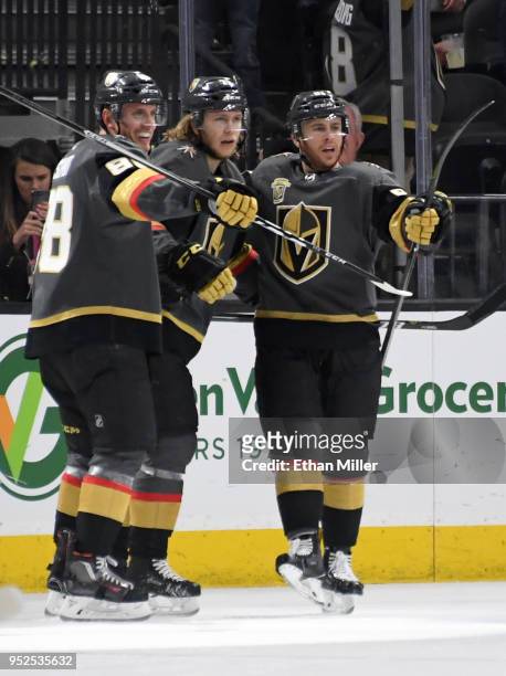 Nate Schmidt, William Karlsson and Jonathan Marchessault of the Vegas Golden Knights celebrate after Karlsson scored a first-period goal against the...