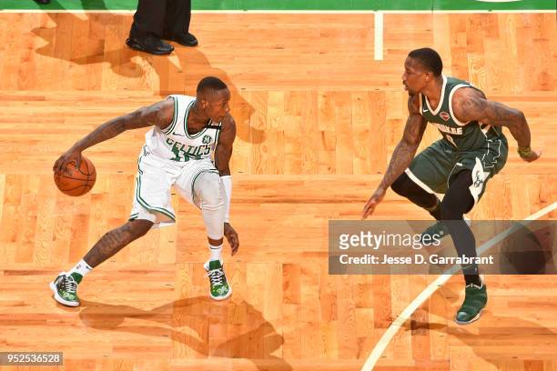 Terry Rozier of the Boston Celtics handles the ball against Eric Bledsoe of the Milwaukee Bucks in Game Seven of the 2018 NBA Playoffs on April 28,...