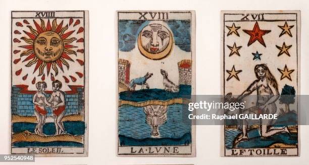 Figure d'Histoire au musée de la carte à jouer le 4 septembre 2014 à issy les Moulineaux, France. Trois cartes d?un tarot révolutionnaire. . Louis...