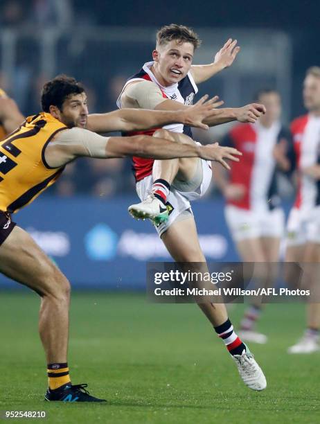 Jack Billings of the Saints kicks the ball during the 2018 AFL round six match between the Hawthorn Hawks and the St Kilda Saints at UTAS Stadium on...