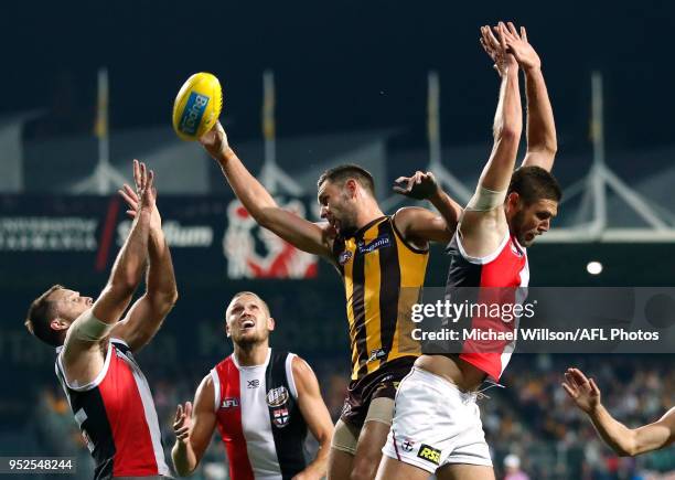 Nathan Brown of the Saints, Sam Gilbert of the Saints, Jack Gunston of the Hawks and Tom Hickey of the Saints compete for the ball during the 2018...