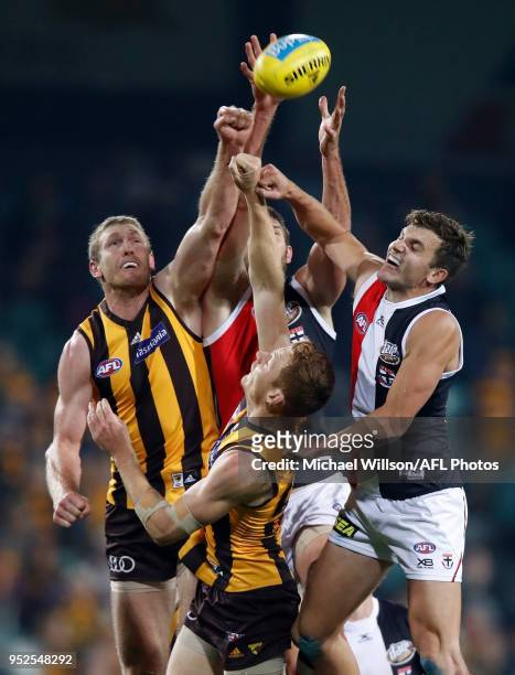 Ben McEvoy of the Hawks, Tom Hickey of the Saints, Tim O'Brien of the Hawks and Brandon White of the Saints compete for the ball during the 2018 AFL...