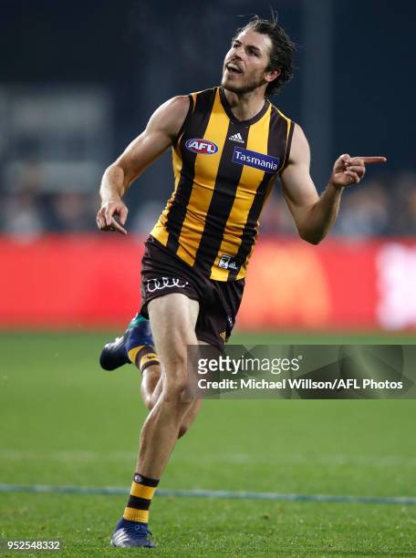 Isaac Smith of the Hawks celebrates a goal during the 2018 AFL round six match between the Hawthorn Hawks and the St Kilda Saints at UTAS Stadium on...
