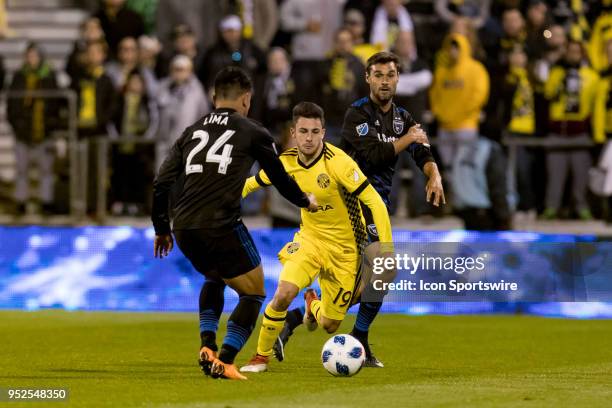 Columbus Crew defender Milton Valenzuela moves past San Jose Earthquakes defender Nick Lima in the MLS regular season game between the Columbus Crew...