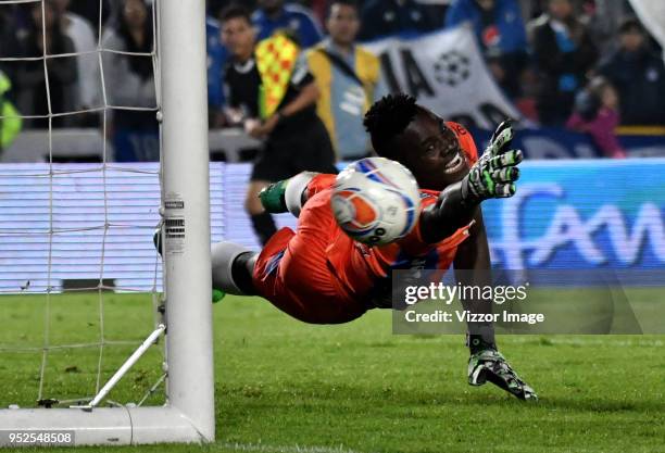 Geovanni Banguera goalkeeper of Atletico Huila reaches for the ball during a match between Millonarios and Atletico Huila at Nemesio Camacho El...