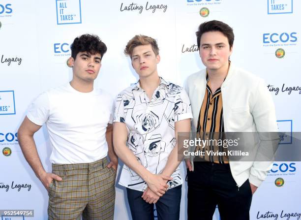 Singers Emery Kelly, Ricky Garcia and Liam Attridge of Forever in Your Mind attend the All It Takes Lasting Legacy event at the headquarters of Earth...