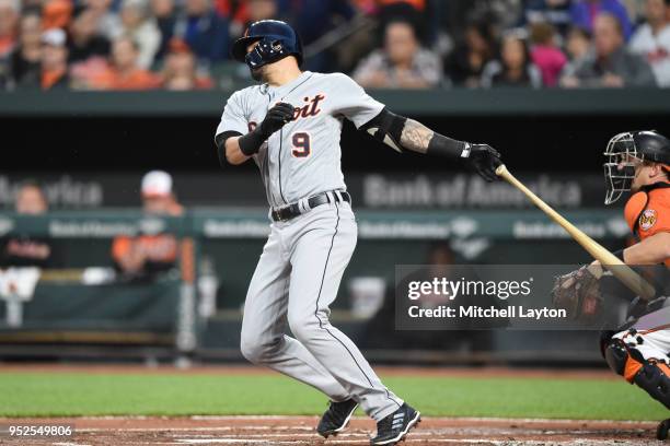 Nicholas Castellanos of the Detroit Tigers singles in Dixon Machado of the Detroit Tigers for a run in the first inning during a baseball game at...