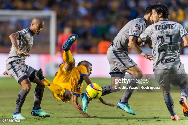 Rafael De Souza of Tigres fights for the ball with Carlos Sanchez, Celso Ortiz and Jorge Benitez of Monterrey during the 17th round match between...