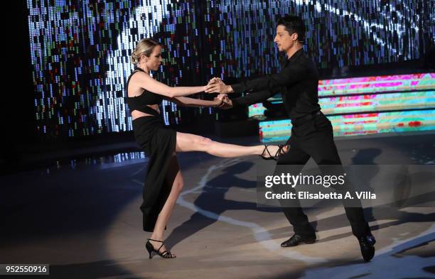 Italian actress Stefania Rocca and her dance partner Marcello Nuzio perform on the Italian TV show Ballando Con Le Stelle at RAI Auditorium on April...