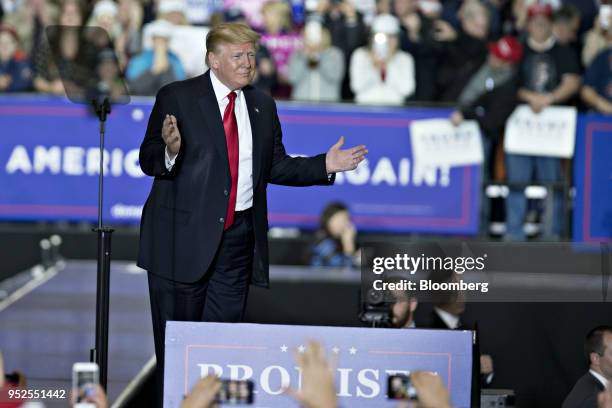 President Donald Trump arrives to speak at a rally in Washington, Michigan, U.S., on Saturday, April 28, 2018. Trump took on most of his usual...