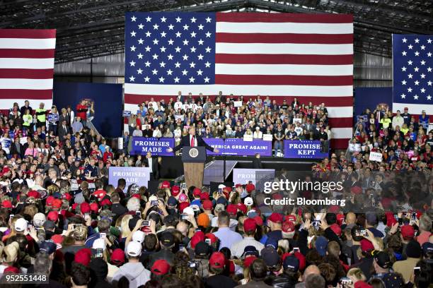 President Donald Trump speaks during a rally in Washington, Michigan, U.S., on Saturday, April 28, 2018. Trump took on most of his usual targets at a...