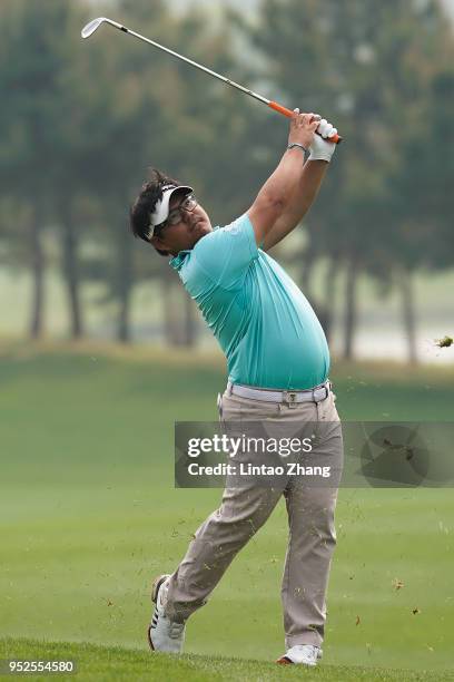 Panuphol Pittayarat of Thailand plays a shot during the final round of the 2018 Volvo China Open at Topwin Golf and Country Club on April 29, 2018 in...