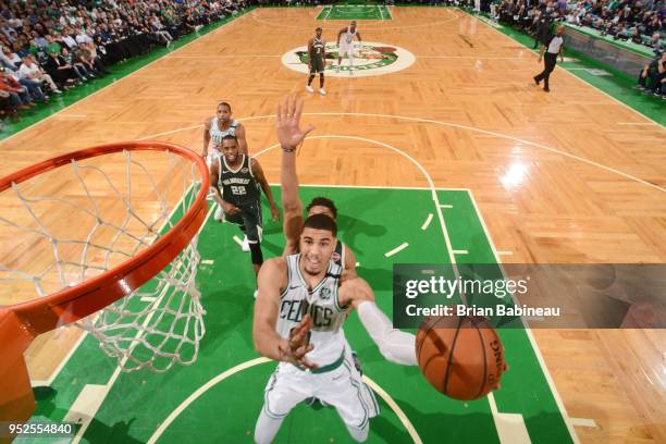 Jayson Tatum of the Boston Celtics goes to the basket against the Milwaukee Bucks in Game Seven of Round One of the 2018 NBA. Playoffs on April 28,...