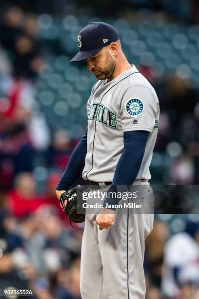 Relief pitcher Marc Rzepczynski of the Seattle Mariners reacts after giving up a run during the seventh inning against the Cleveland Indians at...