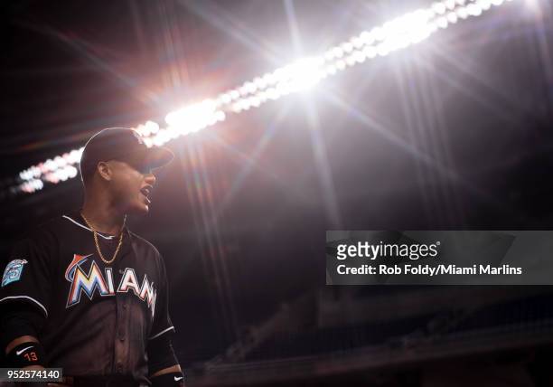 Starlin Castro of the Miami Marlins walks off the field during the game against the Colorado Rockies at Marlins Park on April 28, 2018 in Miami,...
