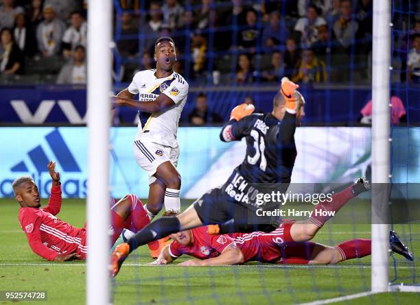Ola Kamara of Los Angeles Galaxy reacts as he kicks the ball wide past Luis Robles of New York Red Bulls during the second half of a 3-2 Red Bulls...