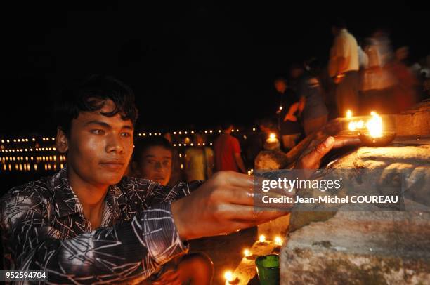 Offering of oil lamps, around the pond of Siddha Pokhari during the festival of Indra Jatra. This festival named after Lord Indra- the God of Rain...