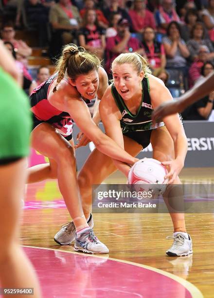 Fiona Fowler of the Thunderbirds competes with Jessica Anstiss of the Fever during the round one Super Netball match between the Thunderbirds and...