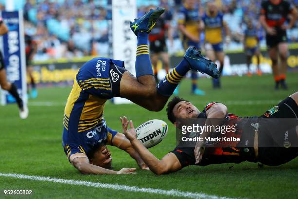 Bevan French of the Eels scores a try during the round Eight NRL match between the Parramatta Eels and the Wests Tigers at ANZ Stadium on April 29,...