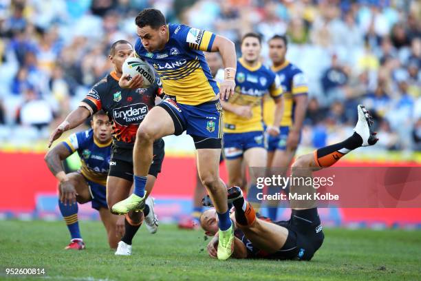 Brad Takairangi of the Eels makes a break during the round Eight NRL match between the Parramatta Eels and the Wests Tigers at ANZ Stadium on April...