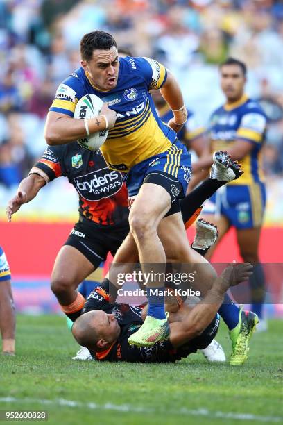 Brad Takairangi of the Eels makes a break during the round Eight NRL match between the Parramatta Eels and the Wests Tigers at ANZ Stadium on April...