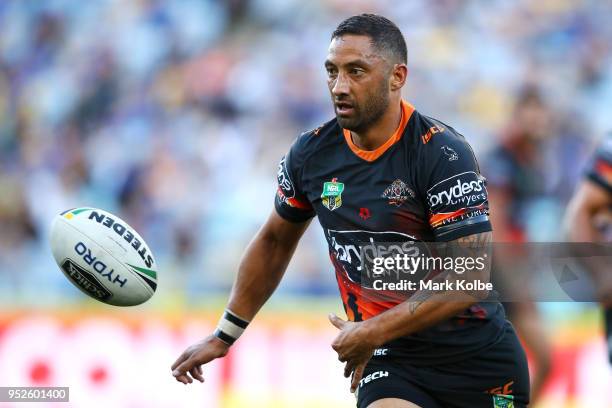 Benji Marshall of the Tigers passes during the round Eight NRL match between the Parramatta Eels and the Wests Tigers at ANZ Stadium on April 29,...