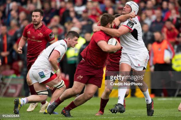 Rhys Marshall of Munster fights with Rory Best of Ulster during the Guinness PRO14 match between Munster Rugby and Ulster Rugby at Thomond Park...