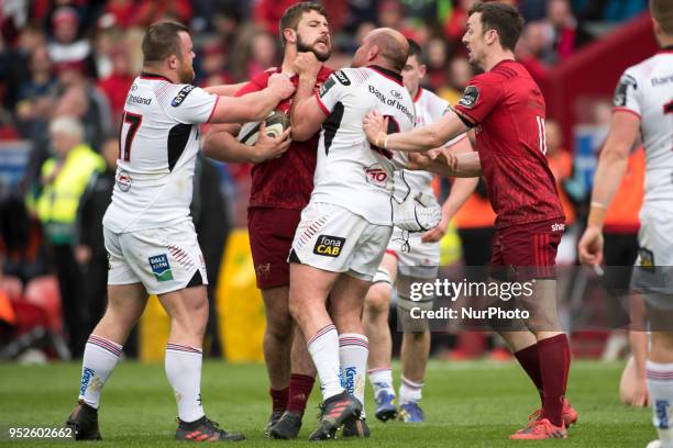 Rhys Marshall of Munster fights with Rory Best of Ulster during the Guinness PRO14 match between Munster Rugby and Ulster Rugby at Thomond Park...