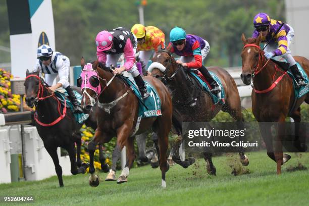 Zac Purton riding Beauty Generation wins Race 6, Champions Mile on Champions Day at Sha Tin racecourse on April 29, 2018 in Hong Kong, Hong Kong.