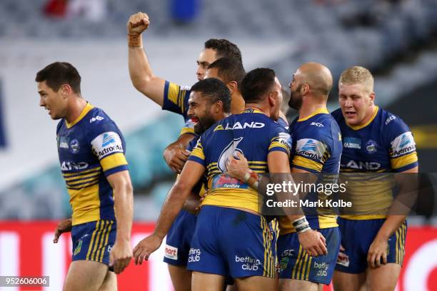 The Eels celebrate victory during the round Eight NRL match between the Parramatta Eels and the Wests Tigers at ANZ Stadium on April 29, 2018 in...