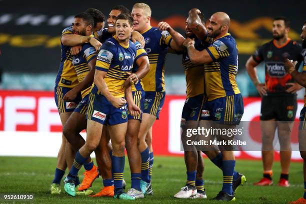 The Eels celebrate victory during the round Eight NRL match between the Parramatta Eels and the Wests Tigers at ANZ Stadium on April 29, 2018 in...