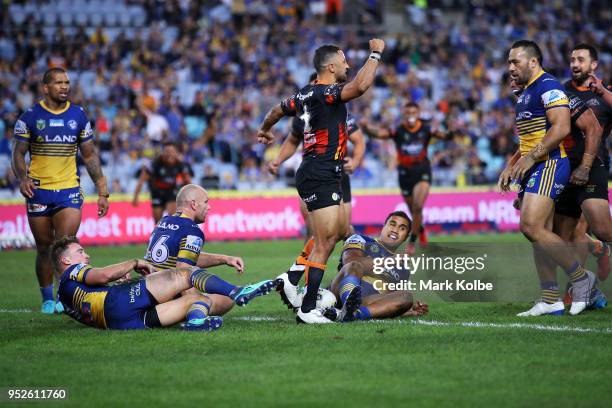 Benji Marshall of the Tigers celebrates scoring a try during the round Eight NRL match between the Parramatta Eels and the Wests Tigers at ANZ...