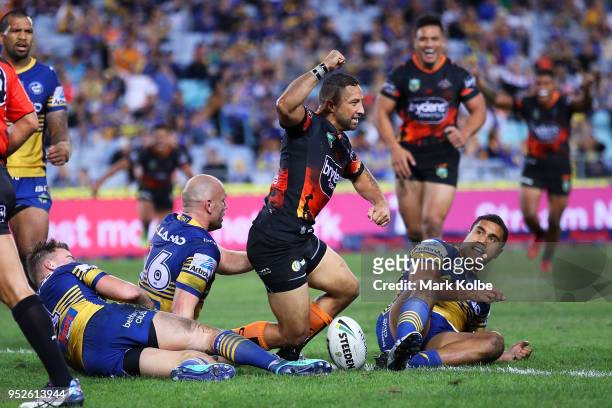 Benji Marshall of the Tigers celebrates scoring a try during the round Eight NRL match between the Parramatta Eels and the Wests Tigers at ANZ...
