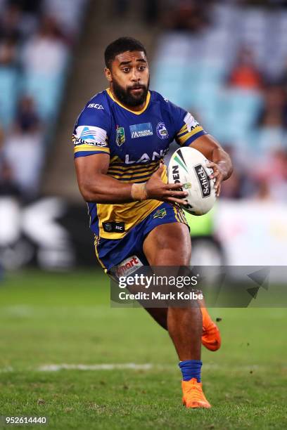 Michael Jennings of the Eels runs the ball during the round Eight NRL match between the Parramatta Eels and the Wests Tigers at ANZ Stadium on April...