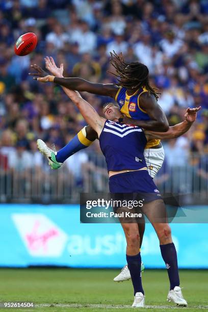 Aaron Sandilands of the Dockers and Nic Naitanui of the Eagles contest the ruck during the Round 6 AFL match between the Fremantle Dockers and West...