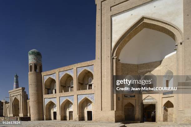 Medersa Kutlimurodinok and Minaret Islam Hoja, Khiva, Uzbekistan.