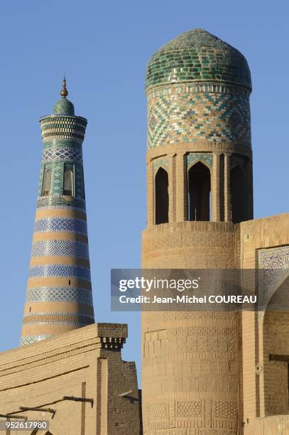 Medersa Kutlimurodinok and Minaret Islam Hoja, Khiva, Uzbekistan.